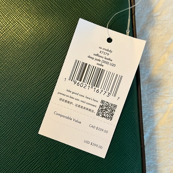 Green Kate Spade purse, brand new with tags and packaging, small blemish. - Picture 3 of 6